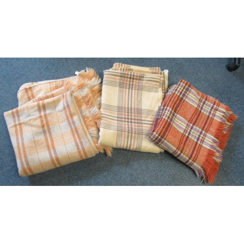 166 - Three vintage woollen check blankets or carthen, in various colourways. (3)
(B.P. 21% + VAT)