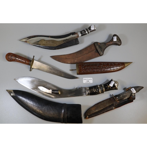 218 - Two Nepalese Kukri and three other knives, Middle Eastern etc. (5)
(B.P. 21% + VAT)