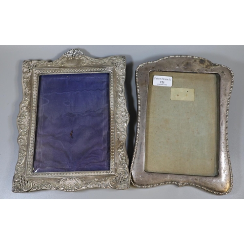 221 - Two silver picture frames, one overall with foliate repoussé decoration.  23x30 and 20x27cm approx. ... 