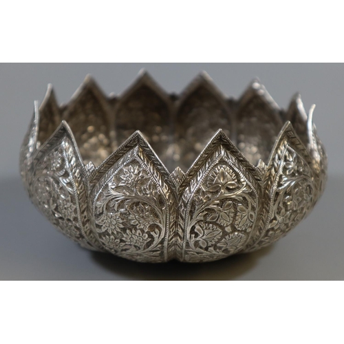 222 - White metal, probably Persian bowl, overall with flowers and foliage.  Diameter 12cm approx.  6.9tro... 