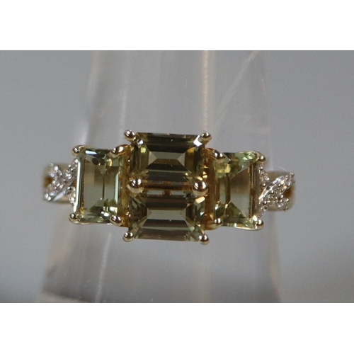 233 - 14ct gold Csarite and diamond dress ring.  Ring size Q.  Approx weight 3.7 grams.  
(B.P. 21% + VAT)