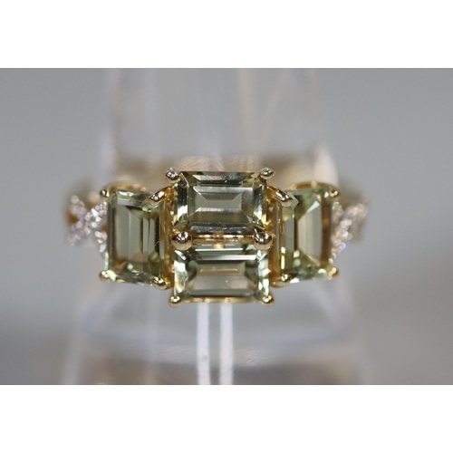 233 - 14ct gold Csarite and diamond dress ring.  Ring size Q.  Approx weight 3.7 grams.  
(B.P. 21% + VAT)