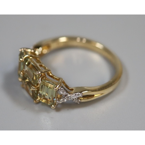 233 - 14ct gold Csarite and diamond dress ring.  Ring size Q.  Approx weight 3.7 grams.  
(B.P. 21% + VAT)