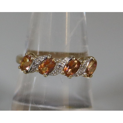 236 - 9ct gold diamond and gemset ring.  Ring size P&1/2.  Approx weight 2.1 grams.
(B.P. 21% + VAT)