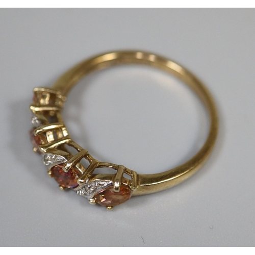 236 - 9ct gold diamond and gemset ring.  Ring size P&1/2.  Approx weight 2.1 grams.
(B.P. 21% + VAT)