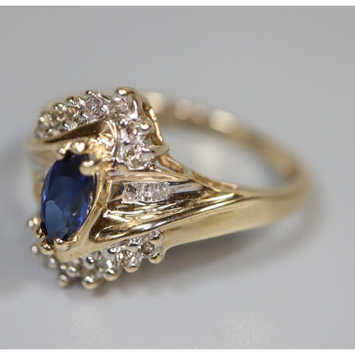 237 - 9ct gold diamond and sapphire ring.  Ring size N&1/2.  Approx weight 3.3 grams.  Stamped 10K