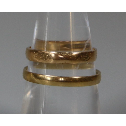 243 - Two 18ct gold wedding rings.  Ring size N&1/2 and J&1/2.  Approx weight 3.5 grams.
 (B.P. 21% + VAT)