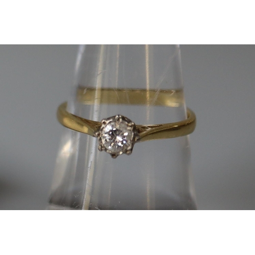 245 - 18ct gold diamond solitaire ring.  Ring size O.  Approx weight 2.6 grams.
(B.P. 21% + VAT)