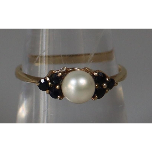 253 - 9ct gold cultured pearl and sapphire ring.  Ring size M.  Approx weight 1.6 grams.
(B.P. 21% + VAT)