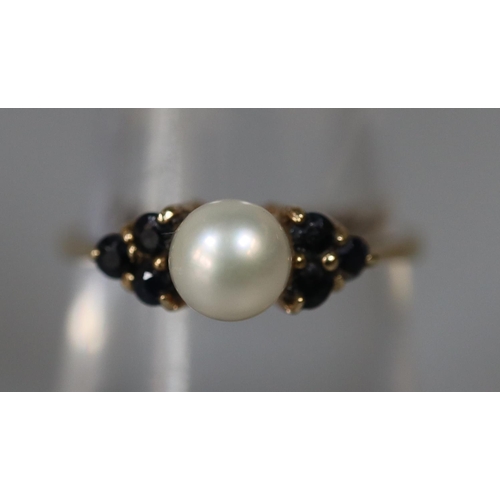 253 - 9ct gold cultured pearl and sapphire ring.  Ring size M.  Approx weight 1.6 grams.
(B.P. 21% + VAT)