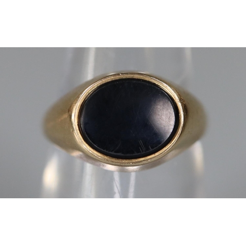 254 - 9ct gold onyx signet ring.  Ring size L.  Approx weight 3.2 grams.
(B.P. 21% + VAT)