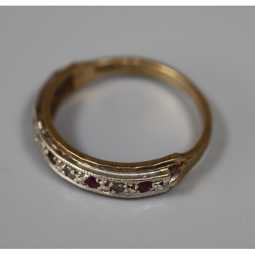 258 - 9ct gold half eternity ring set with rubies and cubic zirconas.  Ring size O.  Approx weight 2.6 gra... 