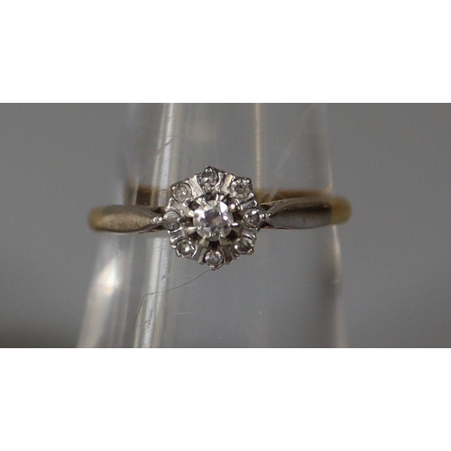 259 - 18ct gold and diamond cluster ring.  Ring size N.  Approx weight 2.3 grams.  
(B.P. 21% + VAT)