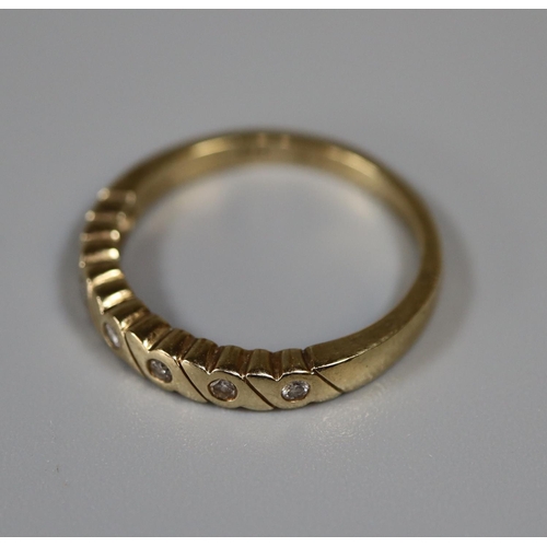 262 - 9ct gold and diamond half eternity ring.  Ring size N&1/2.  Approx weight 2.4 grams.
(B.P. 21% + VAT... 