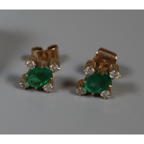 270 - Pair of emerald and diamond earrings set in yellow metal.  Approx weight 2.5 grams.
(B.P. 21% + VAT)