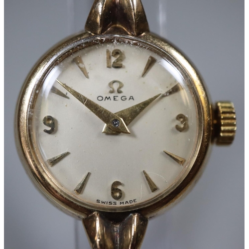 298 - Lady's 9ct Omega wristwatch.  Stamped Omega Watch Co and number 665374 to the inside of the case.  W... 