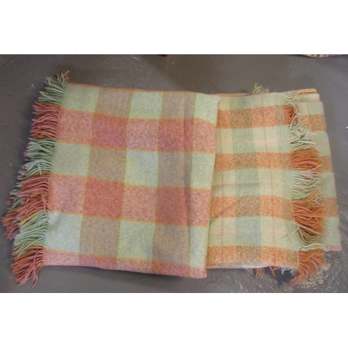 452 - Two vintage woollen check blankets or carthen.
(B.P. 21% + VAT)