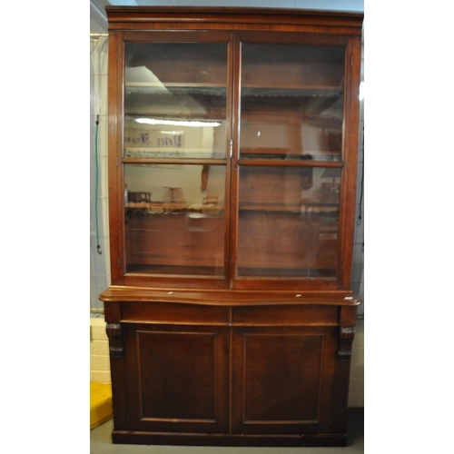 460 - Victorian mahogany two stage cabinet back Solicitor's bookcase having serpentine base with two drawe... 