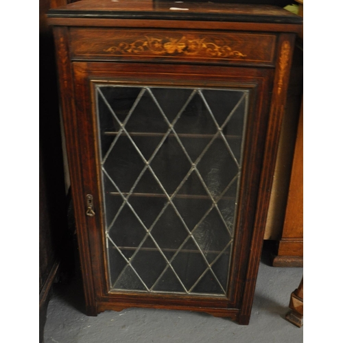 486 - 19th century rosewood inlaid music cabinet, the single lead glazed door revealing fitted shelves, st... 