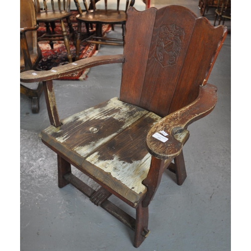 492 - 20th century stained curve back open armchair with armorial crest.  (B.P. 21% + VAT)