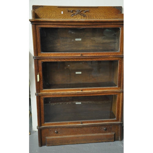 508 - Early 20th century oak 'Globe Wernicke' three sectional bookcase with under drawer, each panel with ... 