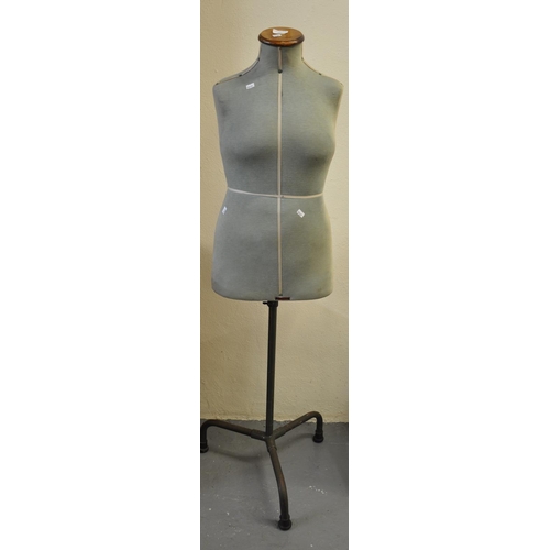 517 - Early 20th century shop mannequin on tubular metal supports and base marked 'Singer'.  (B.P. 21% + V... 