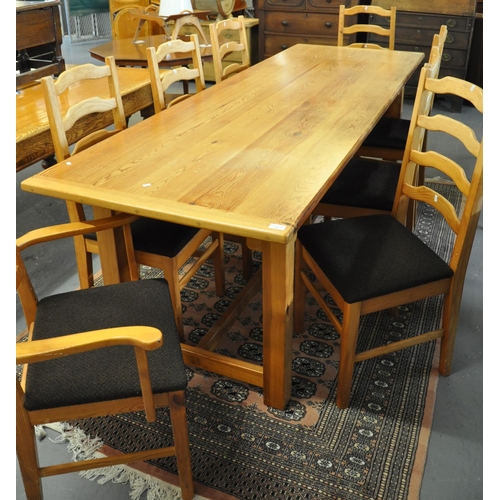 518 - Modern pine kitchen table.  246x82x78cm approx.  Together with a set of eight pine ladder back dinin... 