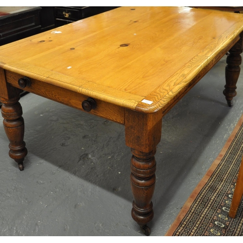 522 - Late Victorian solid oak farmhouse kitchen table, the moulded top above single drawer standing on ba... 