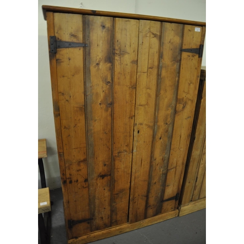 535 - Early 20th century pine two door blind panel cupboard, the interior revealing four fitted shelves.  ... 