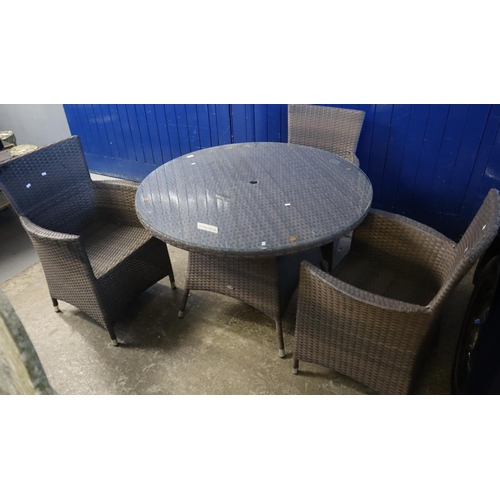 553 - Modern wicker finish garden table with glass top and three matching garden armchairs.  (4)  (B.P. 21... 