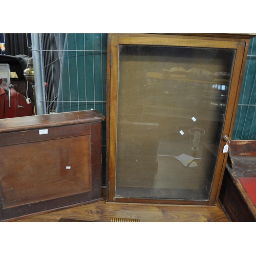 577 - Small stained pine hanging blind panelled cabinet together with another mahogany glazed wall cabinet... 