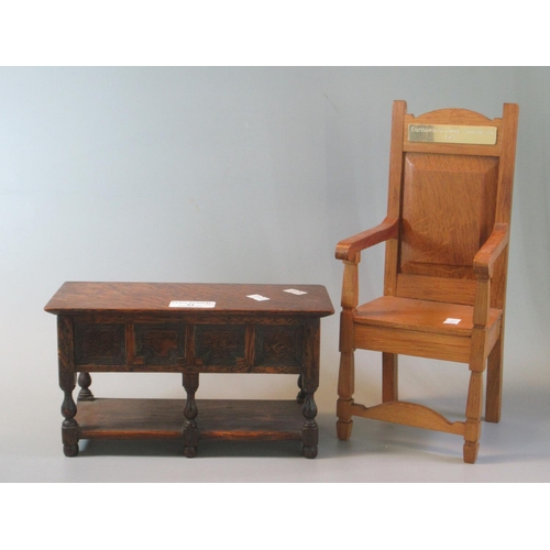 61 - Miniature oak Eisteddfod chair, the plaque marked 1987 Abergorlech, together with another miniature ... 