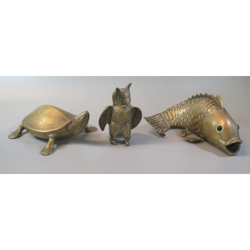 63 - Three brass animals to include: owl, tortoise and Koi carp. (3)
(B.P. 21% + VAT)