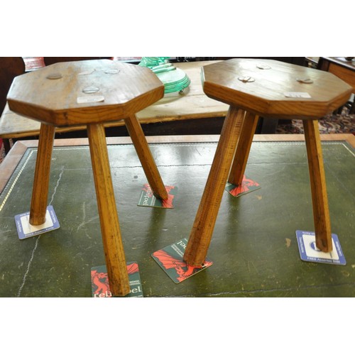 541 - Pair of elm octagonal milking stools.  (2)   (B.P. 21% + VAT)