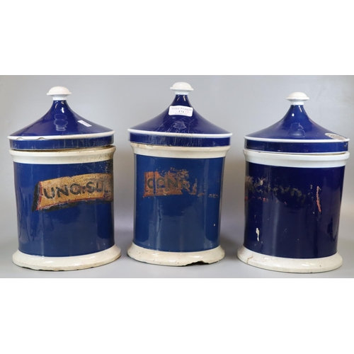 171 - Three 19th Century blue and white apothecary jars and covers with indistinct labels. (3)
(B.P. 21% +... 