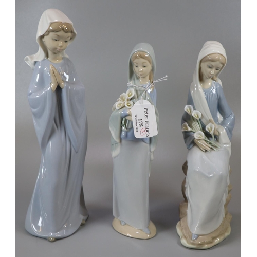 175 - Two Lladro and one Nao Spanish porcelain figurines of young girls, two with flowers. (3)
(B.P. 21% +... 