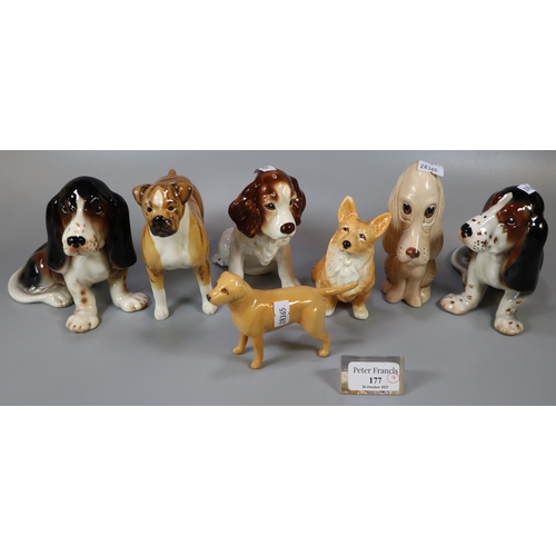 177 - Collection of china dogs to include: Sylvac Corgi, Sylvac hound, bulldog, spaniels etc. (7)
(B.P. 21... 