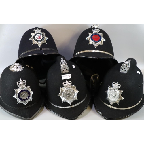 187 - Two boxes comprising five police helmets, to include: Ministry of Defence Police, Heddlu Gwent Polic... 