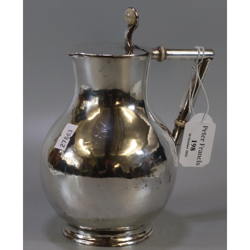 198 - Silver plated baluster shaped 'Tenby' jug with angular insulated handle, in the manor of Christopher... 