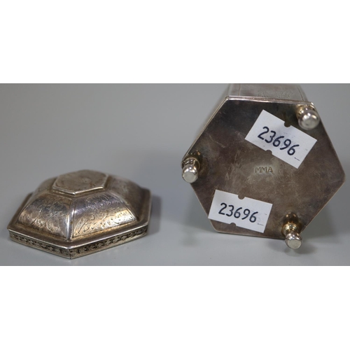 201 - 20th century white metal octagonal shaped box with domed cover, overall engraved with religious and ... 