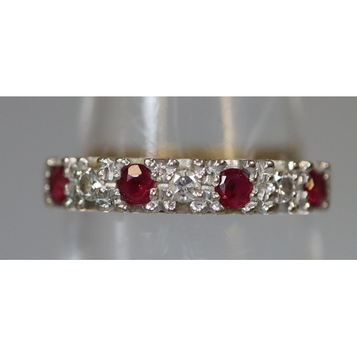 218 - 18ct gold ruby and diamond half eternity style ring.  Ring size M&1/2.  Approx weight 2.8 grams.
(B.... 