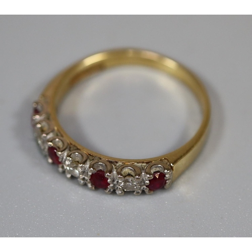 218 - 18ct gold ruby and diamond half eternity style ring.  Ring size M&1/2.  Approx weight 2.8 grams.
(B.... 