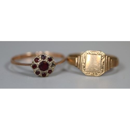 219 - 9ct gold signet ring and a 9ct gold garnet cluster ring (one stone missing).  Ring size M and Q.  Ap... 