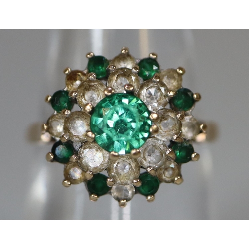 220 - 9ct gold green and white stone cluster ring.  Ring size N.  Approx weight 3 grams.
(B.P. 21% + VAT)