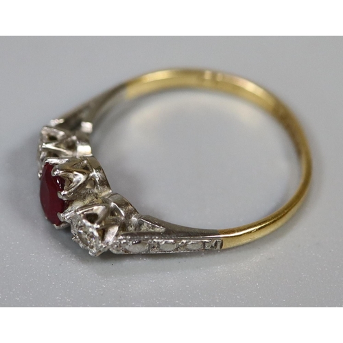 227 - 18ct gold ruby and diamond three stone ring.  Ring size N.  Approx weight 2.1 grams.
(B.P. 21% + VAT... 