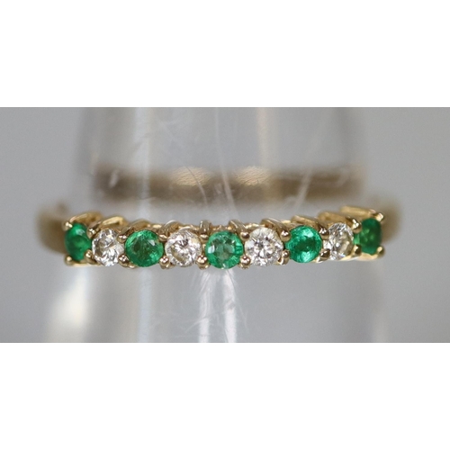 229 - 9ct gold emerald and diamond half eternity style ring.  Ring size N.  Approx weight 1.5 grams.
(B.P.... 