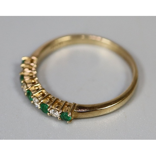 229 - 9ct gold emerald and diamond half eternity style ring.  Ring size N.  Approx weight 1.5 grams.
(B.P.... 