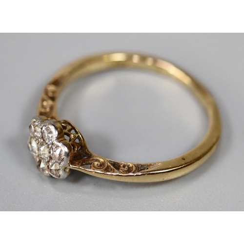 235 - 18ct gold diamond daisy cluster ring.  Ring size N&1/2.
Approx weight 2.2 grams.
(B.P. 21% + VAT)