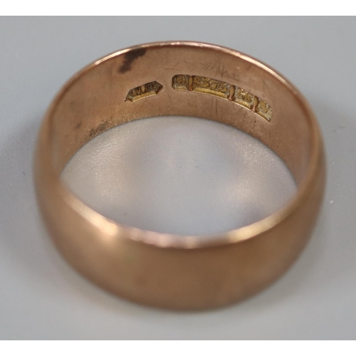 240 - 9ct rose gold wedding ring.  Ring size V.  Approx weight 9.4 grams.
(B.P. 21% + VAT)