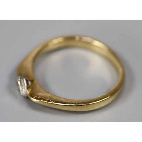 242 - 18ct gold and diamond solitaire ring.  Ring size Q.  Approx weight 3.7 grams.
(B.P. 21% + VAT)